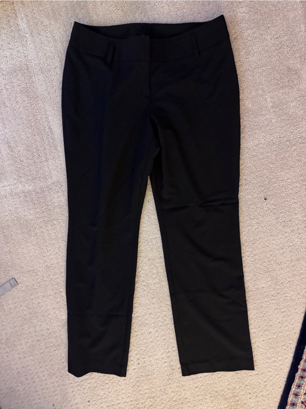 Black full-length trouser.